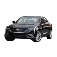 Black 2025 Cadillac CT5 displayed as part of the Cadillac CT4 Luxury fleet for limo service in Chicago.